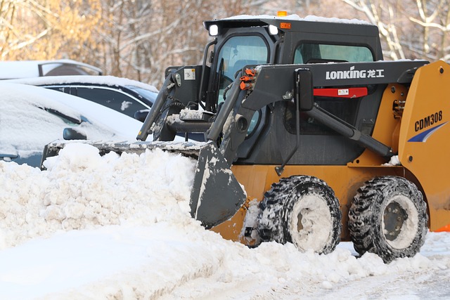 Skid Steer Loader Working to Clear Out Snow